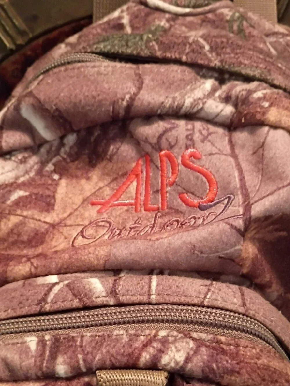Realtree Men's Camo Backpack in Brown and Green with Orange Logo